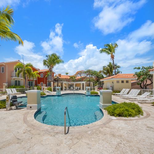 Create unforgettable memories with your loved ones in our tropical pool setting.