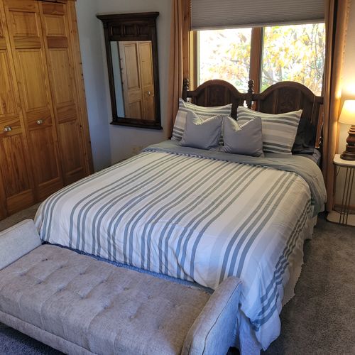 BEDROOM #2 (SECOND FLOOR):  Features a queen-size bed, closet, mirror, and private live-streaming television.