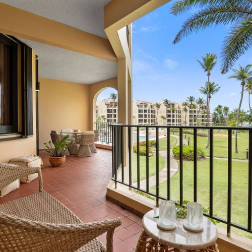 Dine al fresco with a view! Our balcony provides a charming setting with lively scenes of the swimming pool.