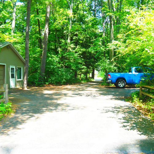 Exterior:  there's a large parking area in front of the detached garage.