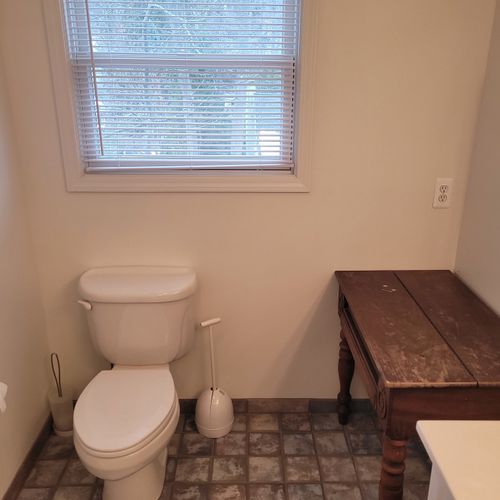 Bathroom #2 (upper level):  full bathroom that is a private en suite bathroom for bedroom #2