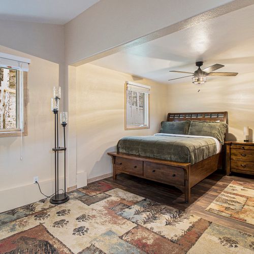 Sleep soundly in this cozy forest-inspired bedroom.