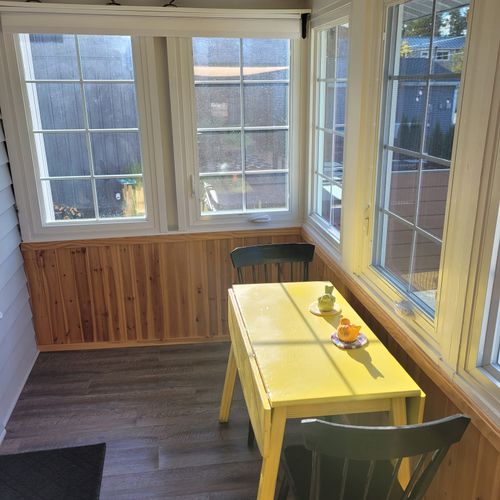 Back porch:  in addition to a fully-enclosed front porch, there is also a fully-enclosed back porch with a super cute little dining table.