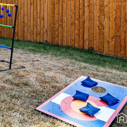 - keep everyone entertained with backyard classics like ladder toss and bean bag toss
- great for friendly competition or outdoor fun during sunny afternoons
- located on soft grass in the fenced yard just steps from the patio area