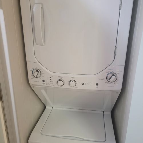 Laundry closet:  the home has a very convenient laundry closet with a stacked washer and dryer. It's conveniently located near the kitchen.