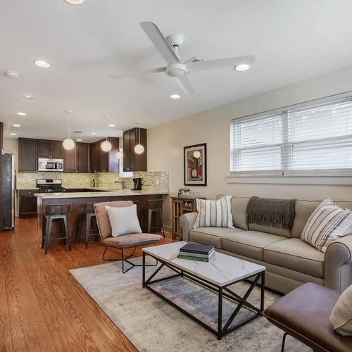 Experience the best of open-concept living in this stylish and comfortable space. The seamless flow from the cozy living area to the modern kitchen makes it perfect for entertaining or relaxing after a day of New Orleans adventures. Enjoy the warm ambiance and thoughtful details throughout.