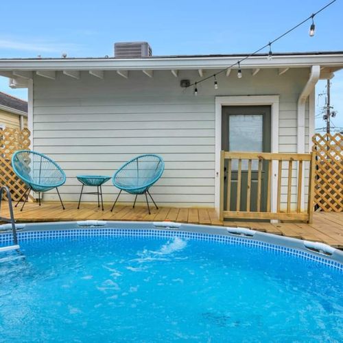 Refreshing above-ground pool in the backyard, ready for a sunny afternoon dip.