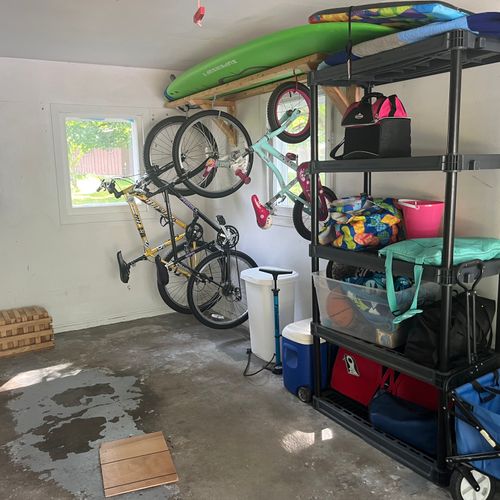GARAGE:  The fun water and beach toys in the garage, which include paddleboards, beach chairs, and bicycles.