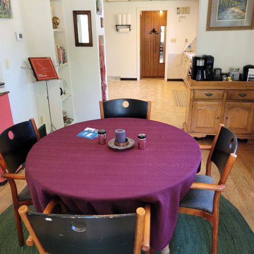 Dining room:  the home has a lovely dining room with a dining table, seating for 6 adults, and a wine bar.