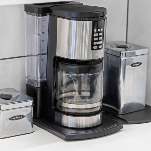 Coffee maker and supplies provided.