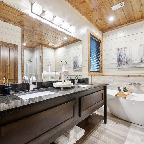 The private bathroom with double vanity and a soaking tub!