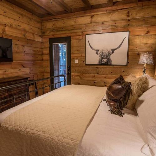 This bedroom comes with a door to the outside patio.