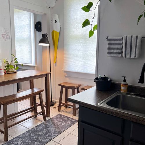 Casual dining nook w/ natural light — a quiet spot for morning coffee.