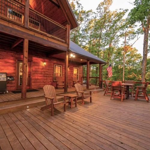 Ample amounts of seating as well as a gas grill on the patio.