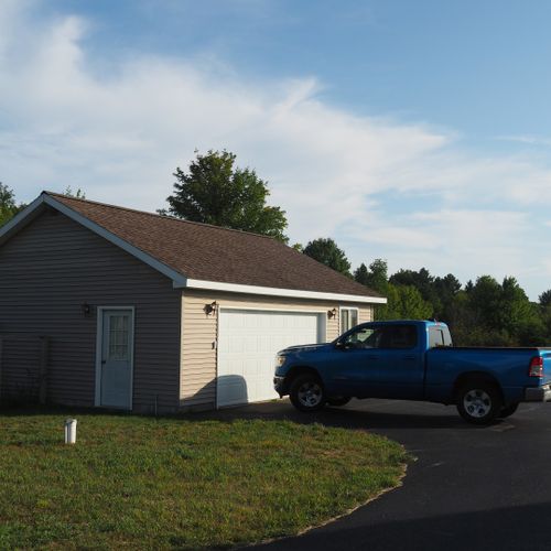 Exterior:  the parking area between the house and the garage. (guests do not have access to the garage. )