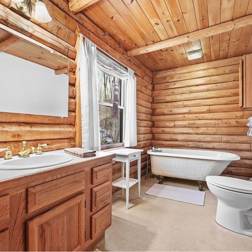 Bathroom #1 (main floor):  full bathroom with an antique tub.