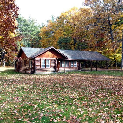Exterior:  another view of the front of the cabin in fall.