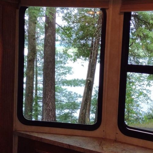 Bedroom #1:  features a queen-size bed, dresser, and a great view of little platte lake.