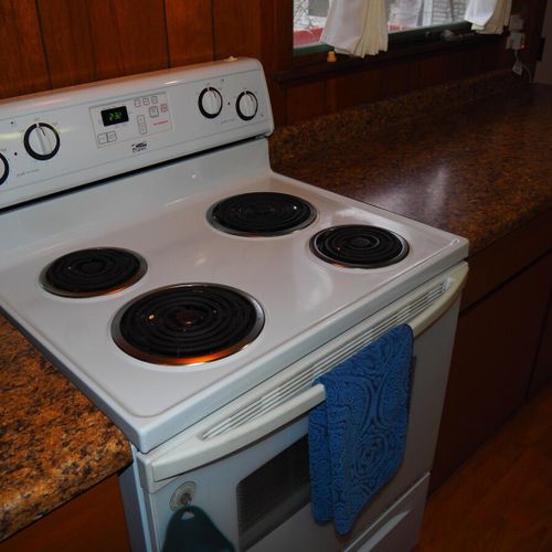 Kitchen:  very convenient and functional galley kitchen with all appliances, including a dishwasher. Includes lots of counter space and a good supply of cooking and dining utensils.