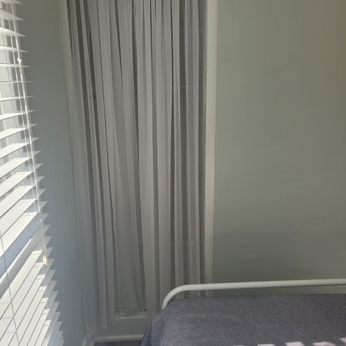Bedroom #2:  features a full-size bed, dresser, mirror, and closet.