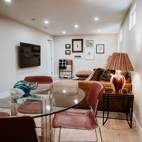 Step into cozy elegance in our downstairs living room. A perfect blend of comfort and style, it's an ideal spot to unwind and socialize. Your retreat, your way!