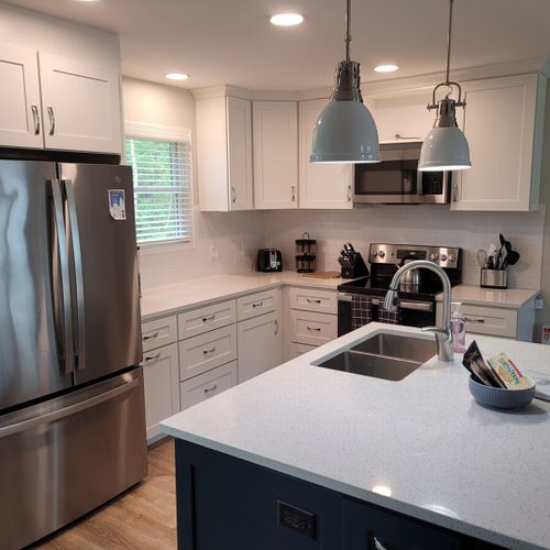Kitchen:  there is a full kitchen with all-new stainless steel appliances (including a dishwasher), a good supply of cooking and dining utensils, and lots of cupboard and counter space.