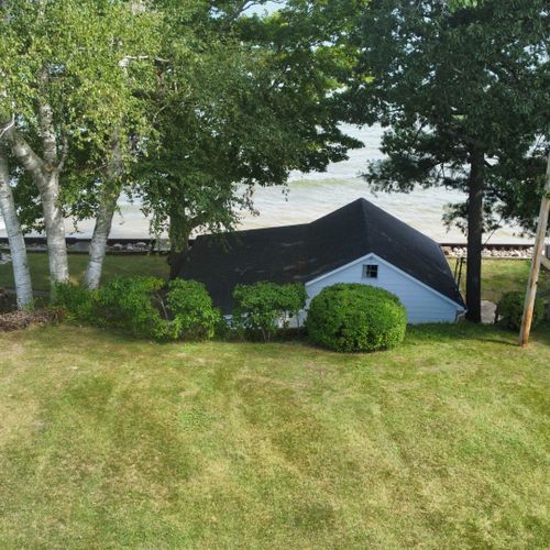 Beach house:  aerial view of the backyard and the beach house.