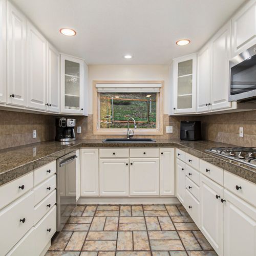 Cook, dine, and relax in this spacious kitchen.