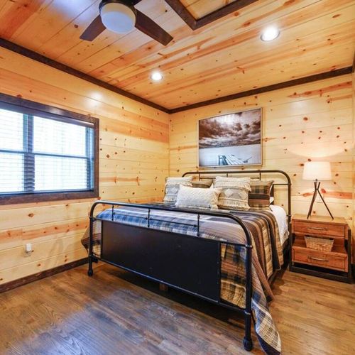 Upstairs King Bedroom 2 with a trundle/daybed and a full private bathroom.