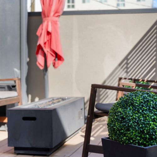 Private outdoor area with seating and space to relax.