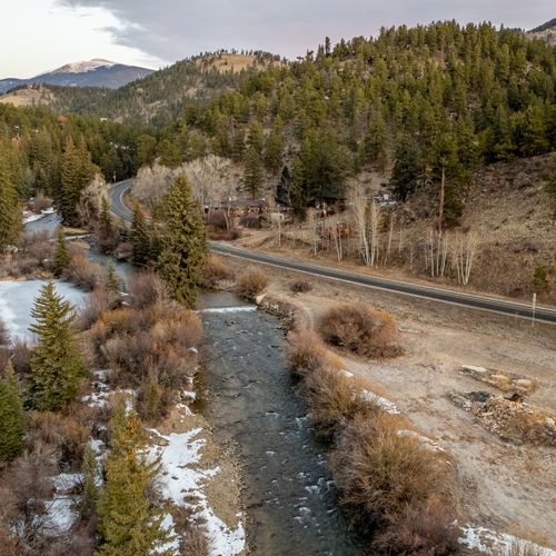 Follow the scenic path just steps from the cabin, leading you straight to the peaceful riverbank!