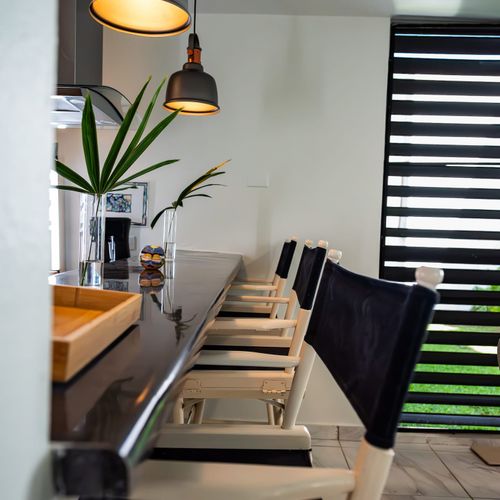 Pull up a seat at our stylish kitchen island, perfect for casual dining, a morning coffee, or simply enjoying lively conversation.