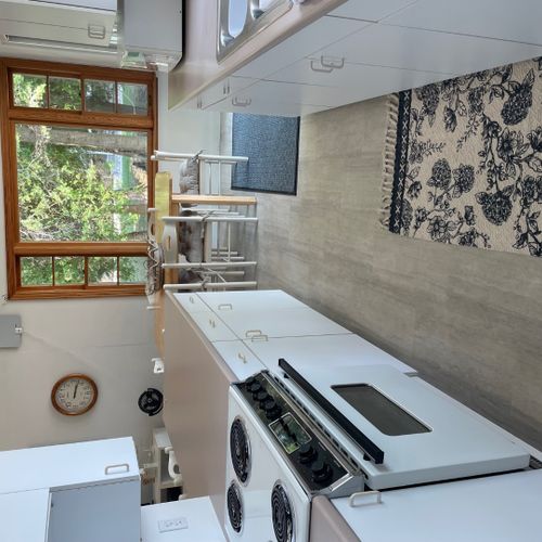 Kitchen:  the cottage has a very cute galley kitchen with all critical appliances. (there is no dishwasher though. )