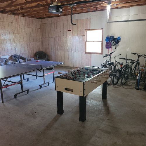 GARAGE:  Guests are welcome to use the garage, which has bicycles, a ping pong table, and a foosball table available for guest usage.