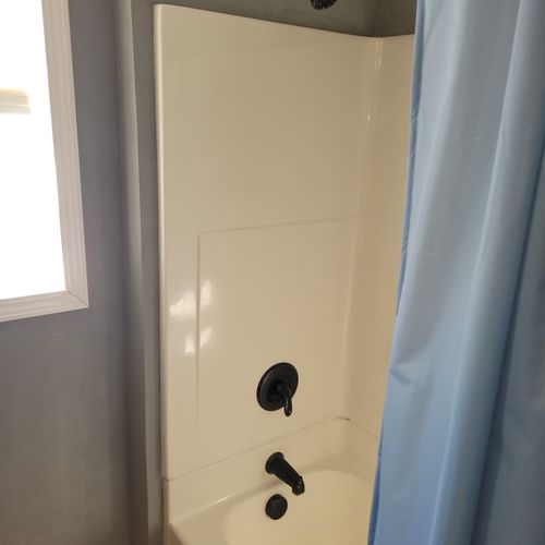 BATHROOM #1 (MAIN FLOOR):  This is a full private ensuite bathroom for Bedroom #1.  It includes a combination tub and shower.