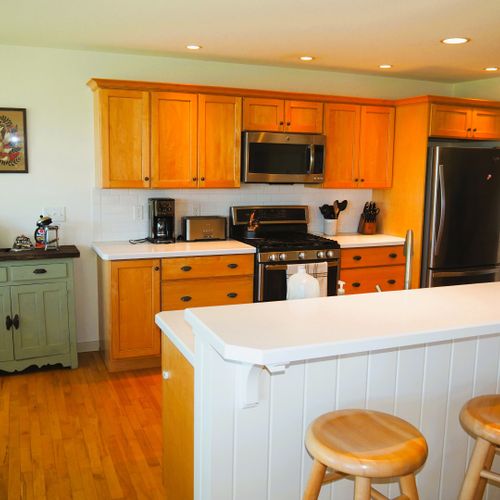Kitchen:  the home has an excellent kitchen will all appliances (including a dishwasher) and a good supply of cooking and dining utensils.