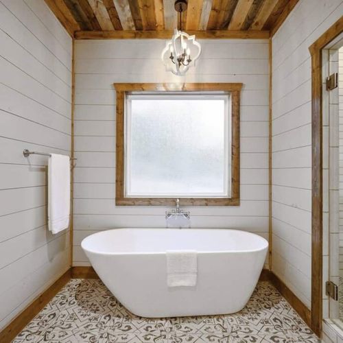 A soaking tub in this private bath!