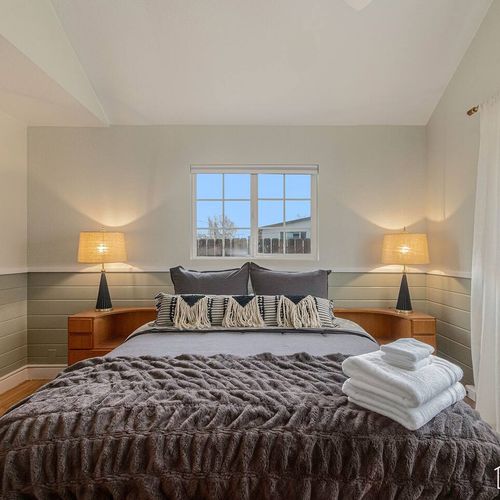 A welcoming secondary room awaits with a queen-sized bed and all the soft touches you need for a restful sleep.
