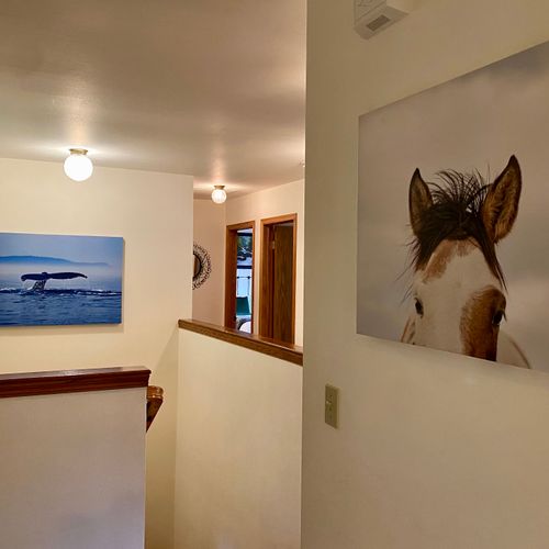 Head downstairs to the game room and third guest bedroom.