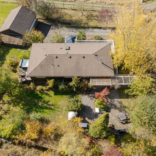 Surrounded by open space and mature trees, the home offers privacy, fresh air, and a true sense of retreat—perfect for unwinding, outdoor meals, or soaking in the quiet after a day of exploring.