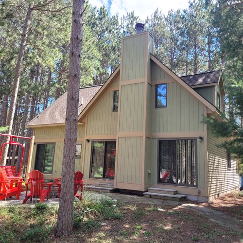 OVERALL:  The front of the cabin in summer