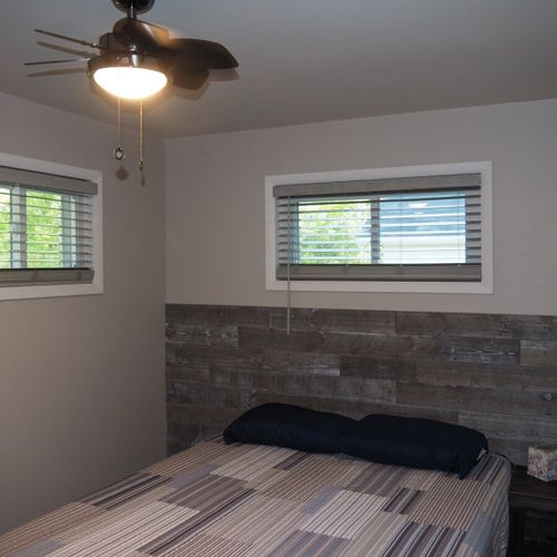 Bedroom #2:  also features a queen-size bed, ceiling fan, and closet.