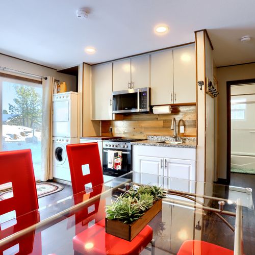 Start your day with sunlight streaming into a comfortable dining space and a kitchen stocked with all the essentials.