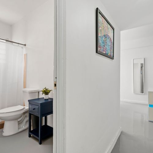 Indulge in the simplicity of our elegant bathroom, where modern design meets absolute comfort.