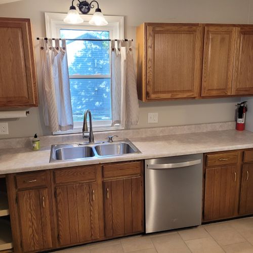 Kitchen:  the home has a fairly large kitchen with all appliances including a dishwasher. Also has a good supply of cooking and dining utensils.