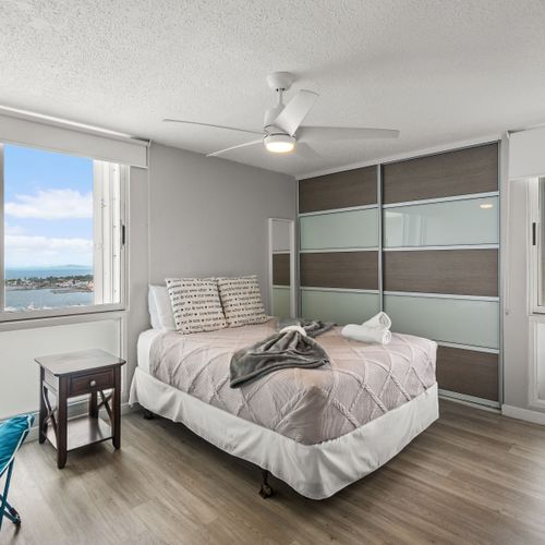 A peaceful escape awaits! This charming bedroom offers a comfortable sleeping environment, ensuring you feel completely refreshed and ready for your day in paradise.