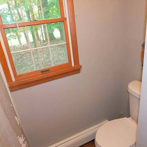 Bathroom #1:  full bathroom with a combination tub and shower.