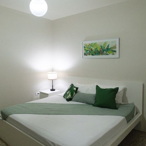Drift off to sleep surrounded by tasteful decor and a comfortable bed. This room offers a harmonious blend of style and coziness for your stay.