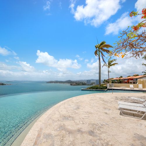 Infinity pool , beachfront views with tanning beds