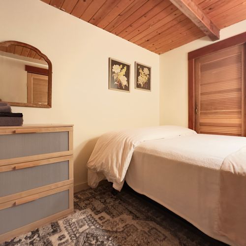 Main-floor bedroom dresser and mirror